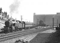 Fairburn 2-6-4T 42200 northbound at Partick North Junction on 2 August 1957 with a Rutherglen - Possil train. The train is about to enter the tunnel which will take it to Crow Road [see image 43304]. <br><br>[G H Robin collection by courtesy of the Mitchell Library, Glasgow 02/08/1957]