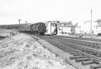 A Fairburn 2-6-4T running tender first approaching Dalmellington station on 28 March 1959 with a train from Ayr.  <br><br>[G H Robin collection by courtesy of the Mitchell Library, Glasgow 28/03/1959]