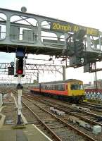 DMU 101690 arriving at Glasgow Central in 1999. The train will terminate at platform 12.<br><br>[Ewan Crawford //1999]