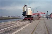 The mobile crane at Irvine Harbour alongside track remaining from the Irvine Harbour branch of the GPK&AR. View east towards Irvine in 1998. In the left background is the clipper ship the <i>Carrick</i> (originally <i>City of Adelaide</i>) now relocated to Port Adelaide, Australia.<br><br>[Ewan Crawford //1998]