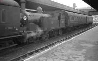 Coming or going? Drummond M7 0-4-4T 30129 is the meat in the sandwich at Yeovil Town in the summer of 1960.<br><br>[K A Gray 09/08/1960]