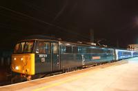 86101 in Caledonian Sleeper livery having been called into frontline service to work the Lowland Sleeper on 15 August 2015. The train is seen here standing at Preston at just after 3am and will leave shortly following a driver changeover.<br><br>[John McIntyre 15/08/2015]