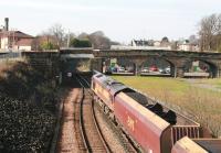 Coal empties from Longannet power station heading west through Alloa on 11 March 2014. The train is passing the site of the original Alloa station, closed in 1968. [See image 36171].<br><br>[John Furnevel 11/03/2014]