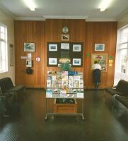 The well-kept waiting room at Troon in July 1997, with photographs showing the station over the decades. This photo itself must be of historic interest: at least I hope something has changed in 18 years. A connection to Larne (for £39) certainly has.<br>
<br><br>[David Panton 17/07/1997]