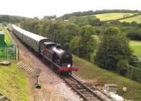 We knew we had overtaken the train; so we stashed the car, and ran back to the bridge, cameras in hand. The 17.20 from Norden to Swanage, which we had missed at two stations, duly came into view; and suddenly it was 1963 again - though I can't remember it first time round! <br><br>[Ken Strachan 15/08/2015]