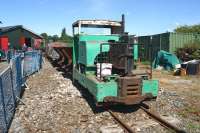 20 hp Motorail 4w DM loco no 31 'Mill Reef' waits in the yard at Becconsall on the WLLR during the Gala Weekend on 8 August 2015. With another 4w DM loco on the other end of a short 'engineers' train, the pair worked in between the normal passenger operation.<br><br>[John McIntyre 08/08/2015]