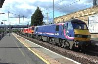 DB Schenker class 90s 90019+90029 working 6V15 Mossend to Didcot through Motherwell on 14 July 2015. The third locomotive is 67011, dead in transit.<br><br>[Ken Browne 14/07/2015]