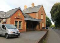 The old booking office of the closed terminus at Sidmouth, still in commercial and residential use in 2015. The town centre and sea front are over a mile away from here and the station and its short branch line closed to passengers in 1967.<br><br>[Mark Bartlett 02/08/2015]