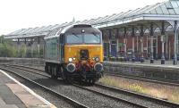 DRS 57302 <I>Chad Varah</I> on a route trainer from Carlisle to Polmadie, on behalf of Virgin trains, passing through Kilmarnock on 19 August 2015. This was the first day of resumption of non passenger traffic since the recent derailment north of New Cumnock.<br><br>[Ken Browne 18/08/2015]