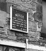 Close up of the detailed warning notice above the entrance to the goods shed at St Leonards in 1977 [see image 52405].<br><br>[Bill Roberton //1977]