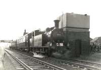 The BLS Bathgate and District rail tour of 6 June 1961 during a stop at Baillieston. The special was hauled by N15 0-6-2T no 69163  and ran from Maryhill Central, finishing at Glasgow Queen Street.<br><br>[G H Robin collection by courtesy of the Mitchell Library, Glasgow 06/06/1961]