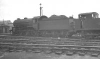 The unique K5 2-6-0 no 61863 photographed in the shed yard at Stratford, thought to have been taken around the time of its withdrawal in 1960. Built at Darlington in 1925, originally as one of 193 Gresley K3s, this example was rebuilt by Thompson at Doncaster in 1945 with a new type of boiler and 2 (rather than 3) cylinders, with the rebuilt locomotive being reclassified K5. The solitary example was withdrawn from Stratford in early June 1960 and cut up at Doncaster by the end of that month.<br><br>[K A Gray //1960]