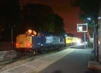 Waiting in the passing loop at Rufford for a service train to arrive from Ormskirk, 37601 is on the rear of a Network Rail test train on 4 August 2015. On the leading end is DBSO 9701.<br><br>[John McIntyre 04/08/2015]