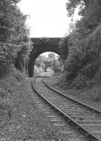 Looking south from Trinity Station through Lennox Row bridge, Trinity Tunnel and in the far distance the former Caledonian Leith North branch, in 1978. [Ref query 3669]<br><br>[Bill Roberton //1978]