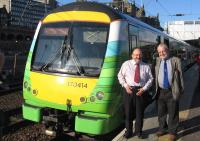 Two former Waverley Route travellers and long-time advocates for the Borders Railway pose beside the first ScotRail train from Edinburgh to Tweedbank on Sunday 6th September. On the left is Allan McLean (ex Virgin Trains and now Scottish Parliamentary Officer of the Campaign for Borders Rail) and to the right is John Yellowlees (ScotRail External Relations Manager and unofficial ambassador for everything ‘railway’ in Scotland).<br><br>[David Spaven 06/09/2015]