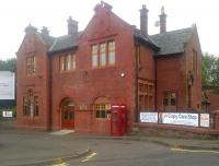 Much abused over the years, Coatbridge Central station, opened by the Garnkirk and Glasgow Railway in 1842 and rebuilt by the Caledonian in 1899. Photographed on 8 September 2015, now restored as a copyshop. [See image 44159]<br><br>[John Yellowlees //]