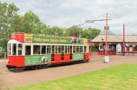 Although the narrow gauge Seaton Tramway follows the old LSWR branch formation (the Seaton Railway) for most of its length it performs a sharp turn outside Seaton and heads for the town centre. No.12, based on a London tram, stands at the purpose built tram terminus before returning to Colyton. <br><br>[Mark Bartlett 01/08/2015]