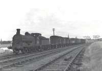 J36 0-6-0 65303 leaving Fraserburgh on 18 August 1959 with a goods train.<br><br>[G H Robin collection by courtesy of the Mitchell Library, Glasgow 18/08/1959]