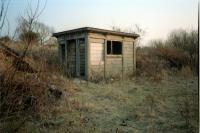 Platelayers hut by the goods sidings at the first Summerston station in 1987. The view is from by the old passenger platform. Maryhill was off to the right.<br><br>[Ewan Crawford //1987]