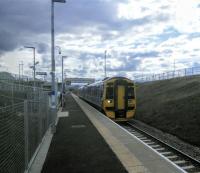 A Tweedbank to Edinburgh service calls at Eskbank in September 2015.<br><br>[David Panton 15/09/2015]