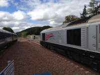 Shot of the 1424 leaving Tweedbank with the CBR special waiting for its path with Silver Jubilee 67026 on front. 60009 at the rear.<br><br>[Bruce McCartney 16/09/2015]