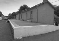 Portpatrick station building and platform in 1988. View looking south. The line from Stranraer approached from the left and the line down to Portpatrick Harbour ran behind the building to the right.<br><br>[Bill Roberton //1988]