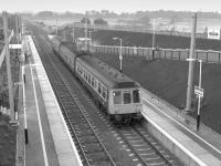 107 431 calls at Musselburgh (New) with an eastbound service on 4 October 1988, the second day of services.  Note the electrification masts in position.<br><br>[Bill Roberton 03/10/1988]