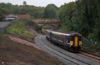 156449 forming the 1246 arrival from Glasgow Queen Street passes the incomplete new connection to the main line as it approaches Anniesland on 23rd September 2015.<br><br>[Colin McDonald 23/09/2015]