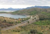 A RENFE Class 447 EMU runs through Costa Bravan countryside as it approaches the penultimate station of Colera with a stopping train to the border town of Portbou.<br><br>[Mark Bartlett 22/09/2015]