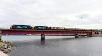 37218 and 37425 Sir Robert McAlpine double head Pathfinder Tours Autumn Chieftain across the Ness Viaduct at the start of the journey to Kyle of Lochalsh.<br><br>[John Gray 26/09/2015]