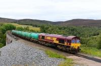 66107 working the Lairg Oil Terminal to Mossend Down Yard empty tank train.Pictured crossing Slochd Viaduct.<br><br>[John Gray 26/09/2015]