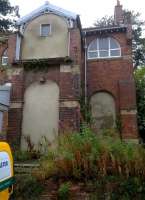 Here is a closer view of the bricked up entrances and exits [see image 52448]. The upper one was the footbridge, the lower one would be to the platform, and the one on the right... also to the platform!<br><br>[Ken Strachan 14/08/2015]