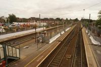 Construction work at Leyland on 26 September 2015 as viewed from the footbridge. The car park on the left side has been taken over as the site yard, all the platform shelters, almost all the seats have been removed and barriers erected as work commences to construct a new footbridge.<br><br>[John McIntyre 26/09/2015]