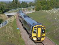 158739 and 158720 head north over the Gore Glen bridge with the 09.45 from Tweedbank to Edinburgh.<br><br>[Bill Roberton 27/09/2015]