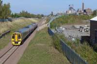 158722 and 158733 pass the site of Lady Victoria Pit signalbox with the 12.11 from Edinburgh to Tweedbank.  The colliery is now the Scottish Mining Museum and the old loco shed is on the right.<br><br>[Bill Roberton 27/09/2015]