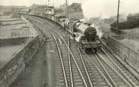 Ex-LMS 'Crab' 2-6-0 42912 runs through Holm Junction with a goods for Elderslie in April 1959. Ardrossan shed stands in the background.<br><br>[G H Robin collection by courtesy of the Mitchell Library, Glasgow 04/04/1959]