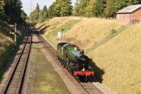 6990 arriving from the north at Rothley viewed from the Station Road overbridge at the start of the Great Central Railway Gala.<br><br>[Peter Todd 02/10/2015]