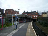 Looking back along the Southport/Kirkby platform at Wigan Wallgate towards the street level booking hall. [See image 18588]<br><br>[Veronica Clibbery 17/09/2015]