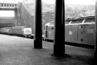 47707 <I>Holyrood</I> with a Glasgow - Edinburgh shuttle service waiting to leave Queen Street in December 1982 as a classmate arrives with a service from Aberdeen.<br><br>[John Furnevel 08/12/1982]