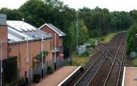 View of Maryhill Park Junction over Maryhill station on 23rd September 2015. The unused replacement signal box can be seen to the left of centre.[See image 52785]<br><br>[Colin McDonald 23/09/2015]