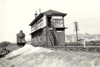 Scene alongside Singer signal box on 12 April 1958 with class J37 0-6-0 64638 in attendance. The original alignment was to the left and the view looks west. [Ref query 7234]<br><br>[G H Robin collection by courtesy of the Mitchell Library, Glasgow 12/04/1958]