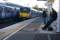 318254 arrives at Partick on 08 October 2015 with a service to Airdrie.<br><br>[John McIntyre 08/10/2015]