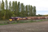 DBS 66193 stands in the loop at the site of Challow Station with a train of steel empties, returning to Margam from Tilbury on 081015.<br><br>[Peter Todd 08/10/2015]