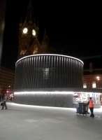 A night view [see image 52863] across Kings Cross Square to St. Pancras. The structure in the foreground appears to be air handling equipment.<br><br>[Ken Strachan 30/09/2015]