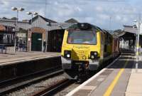 Freightliner 70010 powers through Didcot with an eastbound container train on 081015. <br><br>[Peter Todd 08/10/2015]