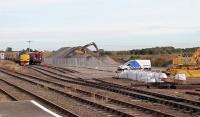 View towards Wick from the platform at Georgemas Junction on 14 October 2015 with a ballast train standing in the sidings. [Ref query 47642] <br><br>[Andy Furnevel 14/10/2015]