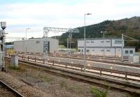 Grab shot from a passing train showing part of the new facilities being built at Swansea on the site of the old carriage sidings. Photographed on 17 October 2015 [see image 18589].<br><br>[Alastair McLellan 17/10/2015]