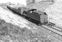 Ayr based Fowler 4F 0-6-0 no 44329, photographed near Trabboch, between Annbank and Belston Junction, on 30 March 1959. The train is the K45 trip to Littlemill Colliery, Rankinston. [Ref query 2857] <br><br>[G H Robin collection by courtesy of the Mitchell Library, Glasgow 30/03/1959]