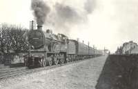 40667 pulls away from Stevenston on 4 April 1959 with a Glasgow St Enoch - Largs train.<br><br>[G H Robin collection by courtesy of the Mitchell Library, Glasgow 04/04/1959]