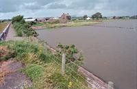 North end of the Solway Viaduct in 1998 looking north. The effluent pipeline from Chapelcross Powerstation, which used the trackbed for 5kms, is on the left and the powerstation in the distant centre.<br><br>[Ewan Crawford //1998]